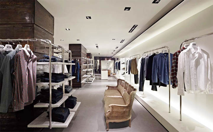 V2K Designers – Thiết kế nội thất shop thời trang trên nền trắng Khu trưng bày đồ nam